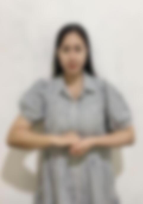ERNING SURATIAH — Indonesian maid in Singapore